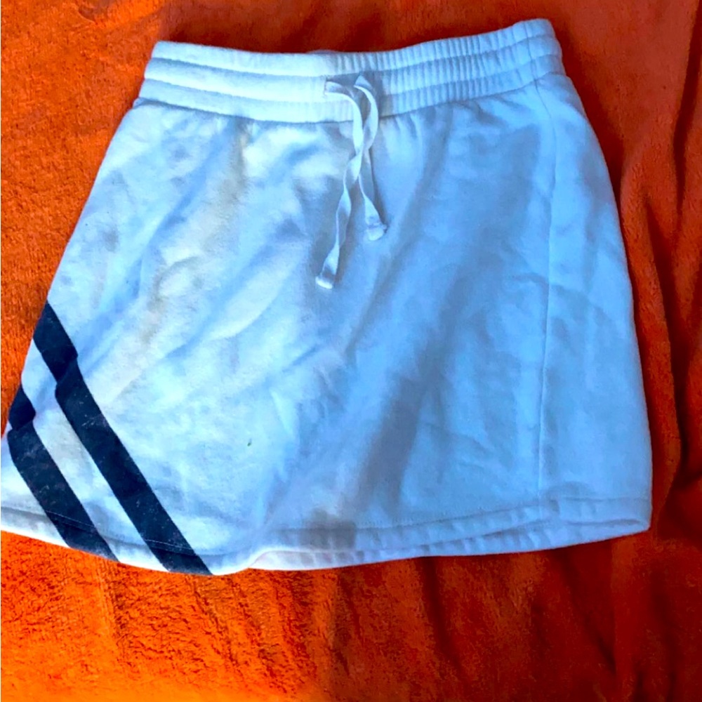 White skirt with two navy strips on one side